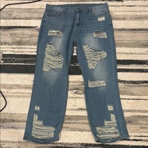 Distressed blue jeans